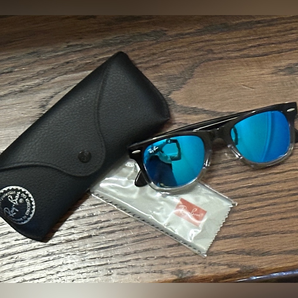 RayBans NWT Black / Clear Frame with blue metallic lenses